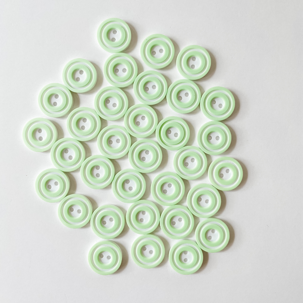 White button with bright border